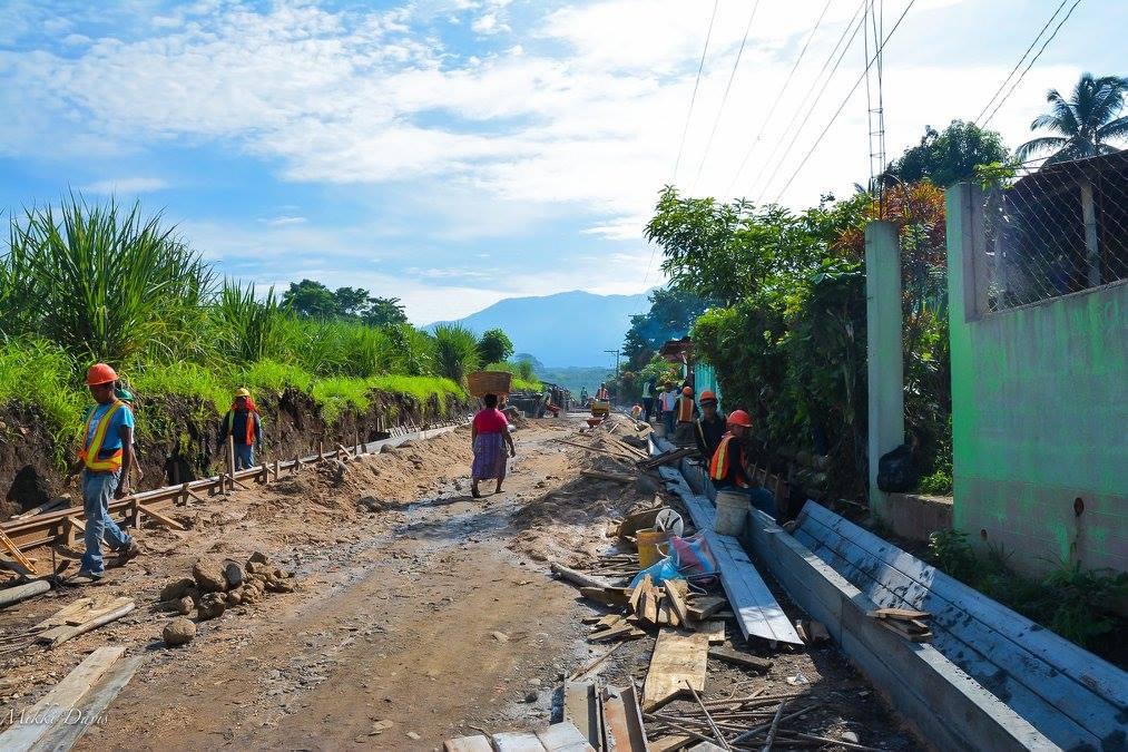 Road and water-line construction alongside a rural Central American community